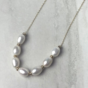 
                  
                    Seven Pearl Necklace
                  
                